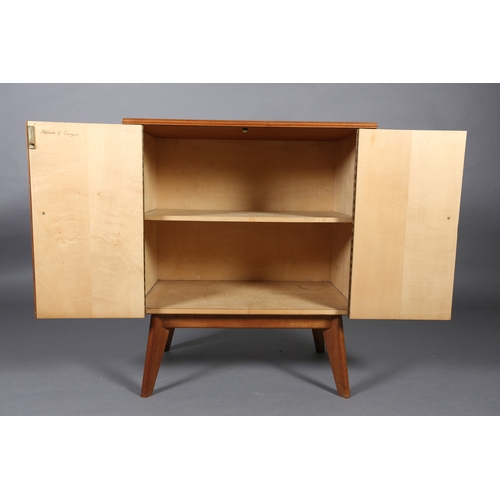 97 - A Morris of Glasgow 'Cumbrae' two door coromandel veneered cabinet, maple lined interior with shelf,... 