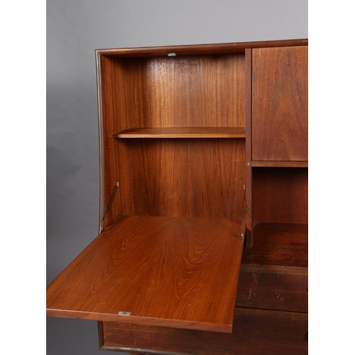 87 - A G-Plan teak cabinet circa late 1960's, having a drop front, two door cupboard above an open compar... 