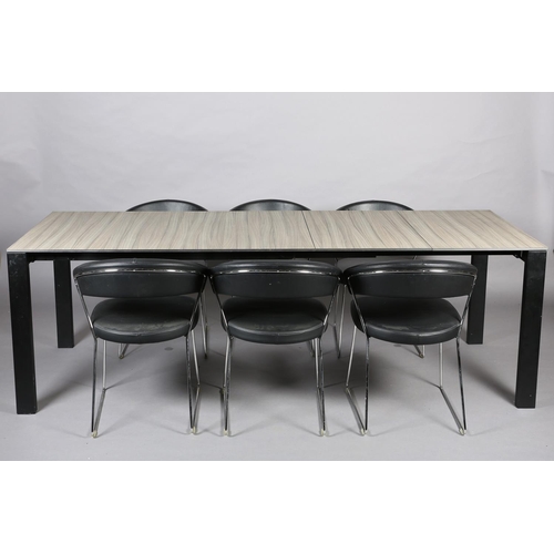 43 - Calligaris, Italy, A grey ceramic and metal extending dining table and six black leather-effect chai... 