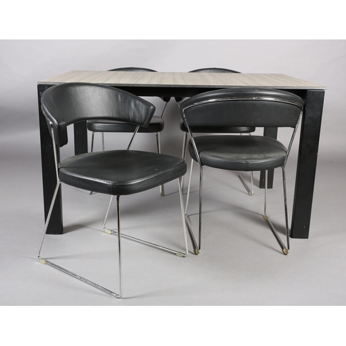 43 - Calligaris, Italy, A grey ceramic and metal extending dining table and six black leather-effect chai... 