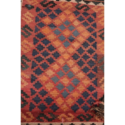 139 - Two small Middle Eastern kilims of lozenge design in madder, camel and brown and coral, turquoise, d... 