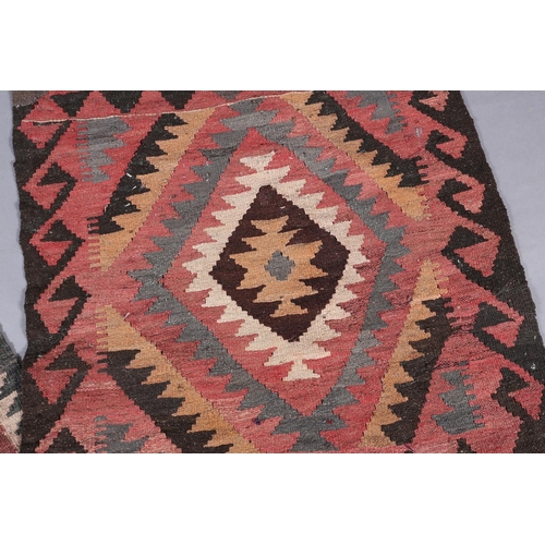 139 - Two small Middle Eastern kilims of lozenge design in madder, camel and brown and coral, turquoise, d... 