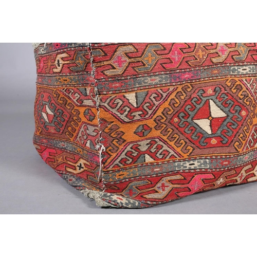 108 - A large flatweave camel bag of geometric design in orange, pink, brown and camel, 95cm x 60cm