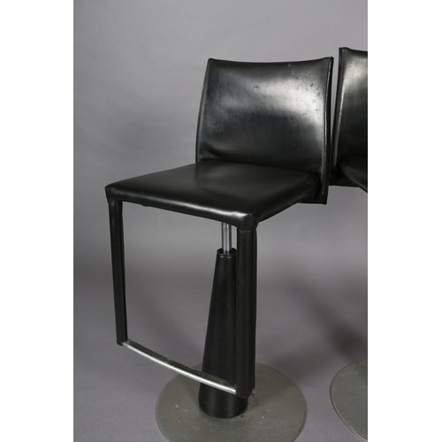 119 - A pair of Frag black leather swivel bar stool on a conical pedestal and disc base