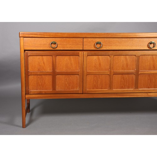 92 - Nathan, a teak sideboard, 1970s, having three drawers across with gilt metal ring handles above a sq... 