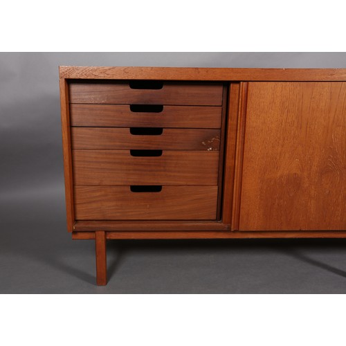 73 - An afromosia sideboard by Fyne Lady of Banbury, having four sliding doors, fitted with five drawers ... 