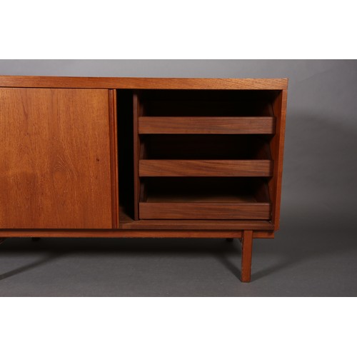 73 - An afromosia sideboard by Fyne Lady of Banbury, having four sliding doors, fitted with five drawers ... 