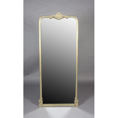 45 - A gilt framed wall mirror, rectangular with rounded corners, with cartouche and foliate cresting and... 