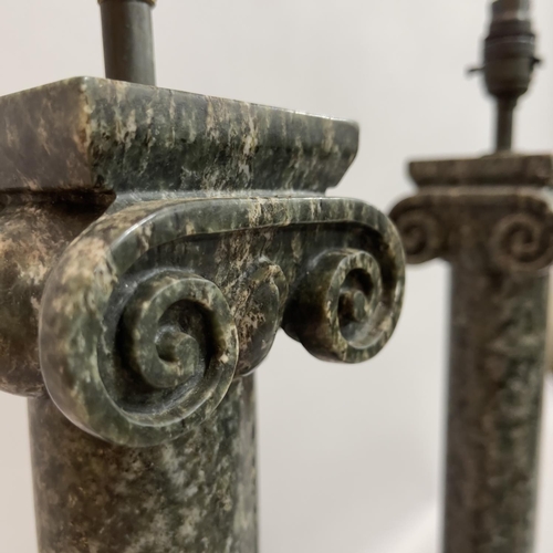 65 - A pair of granite ionic column table lamps on stepped square base, 63cm high