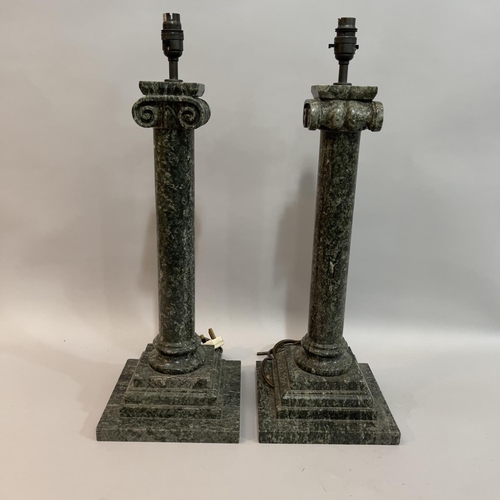 66 - A pair of granite ionic column table lamps on stepped square base, 63cm high