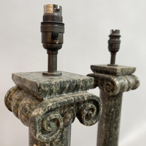 66 - A pair of granite ionic column table lamps on stepped square base, 63cm high