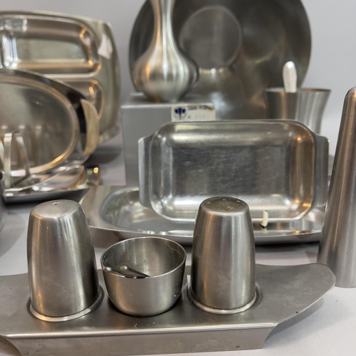 69 - A quantity of stainless steel table ware c1970s, Danish and Old Hall including cruets, bowl, toast r... 