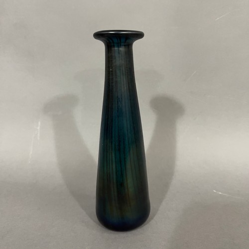 56 - John Ditchfield (b. 19520
An aquamarine and blue iridescent glass vase of tapered form with everted ... 