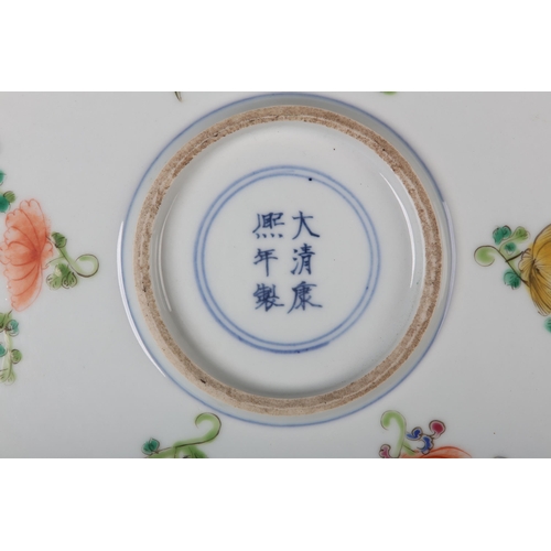 17 - A Chinese famille rose charger, painted to the centre with water fowl amongst lily pads with a wavy ... 