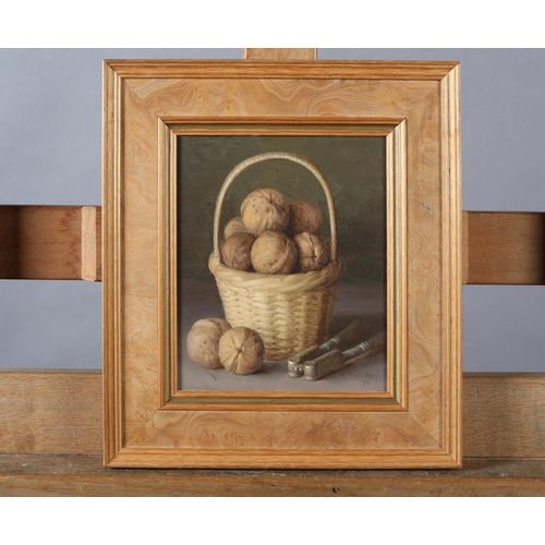 21 - ARR Gerald Norden (1912-2000), Basket of walnuts and nutcrack, still life, oil on board, signed and ... 