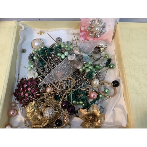 365B - A collection of late 20th century costume jewellery including brooches, hat pins and earrings togeth... 