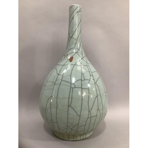 10 - A large Chinese celadon crackle glaze vase, remnants of wax seal attached, 57cm high