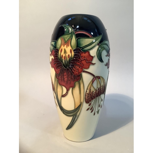 20 - A Moorcroft pottery vase of Anna Lily design, ovoid, impressed mark and painted 98 to underside, 8.7... 