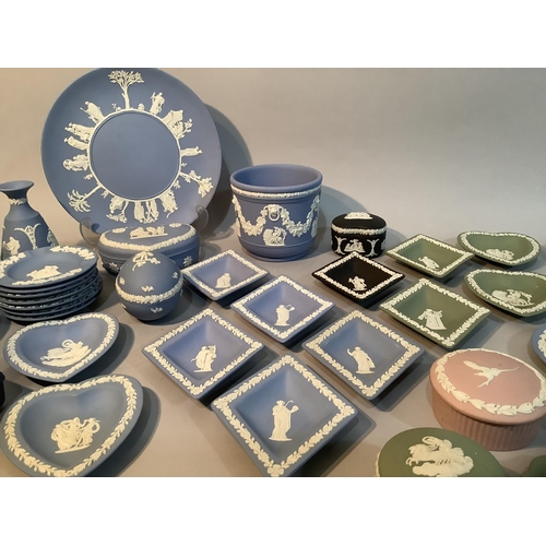 22 - A collection of Wedgwood Jasper ware, including a black trinket box and lozenge shaped pin dish, a p... 