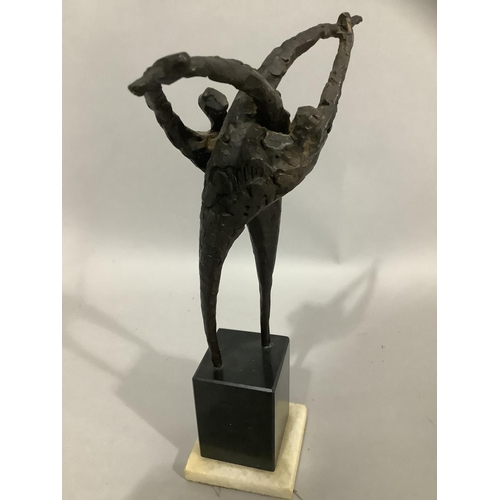 33 - A 20/21st Century bronze group of two figures entwined, raised on a black marble plinth with alabast... 