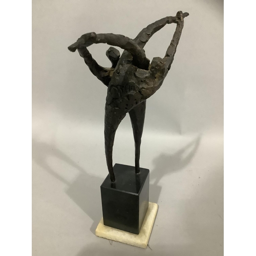 33 - A 20/21st Century bronze group of two figures entwined, raised on a black marble plinth with alabast... 