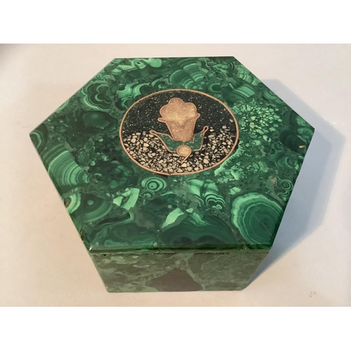 40 - A malachite composition box and cover of hexagonal outline, the cover inlaid in terrazzo and gilt me... 