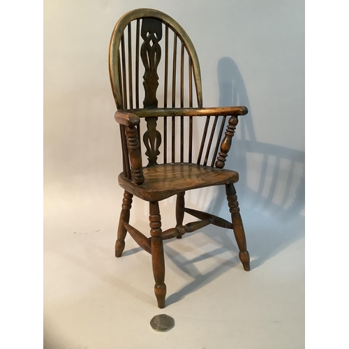 43 - An elm model of a high back Windsor armchair with H stretcher, 36.5cm high