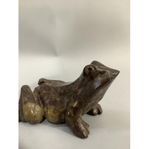 6 - A carved jasper figure of a frog 14cm long x 8cm high (damage to one toe)