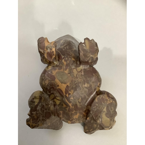 6 - A carved jasper figure of a frog 14cm long x 8cm high (damage to one toe)