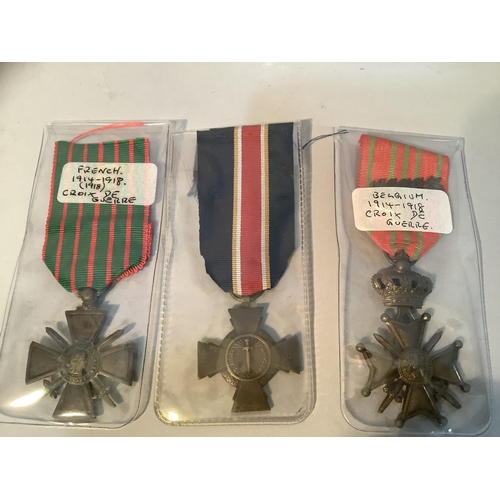 354 - A French 1914/18 Croix de Guerre with ribbon together with a Belgian 1914/18 Croix de Guerre with ri... 