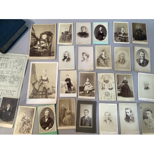 217 - A collection of Victorian and early 20th century portrait photographs, contained in a book shaped bo... 