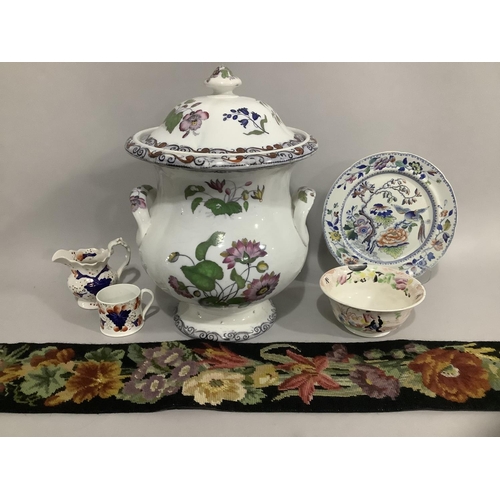 216 - A large 19th century lidded tureen with twin handles painted with flowers, a Gaudy Welsh cup and jug... 