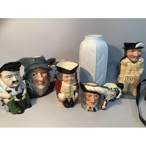 211 - A Royal Doulton Sir Francis Drake character jug together with Rip Van Winkle, Jolly Toby and two oth... 