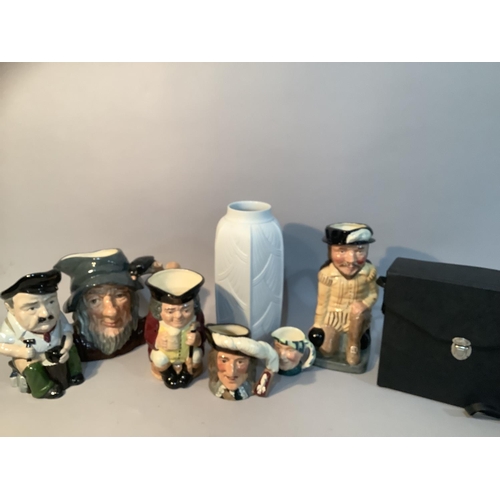 211 - A Royal Doulton Sir Francis Drake character jug together with Rip Van Winkle, Jolly Toby and two oth... 