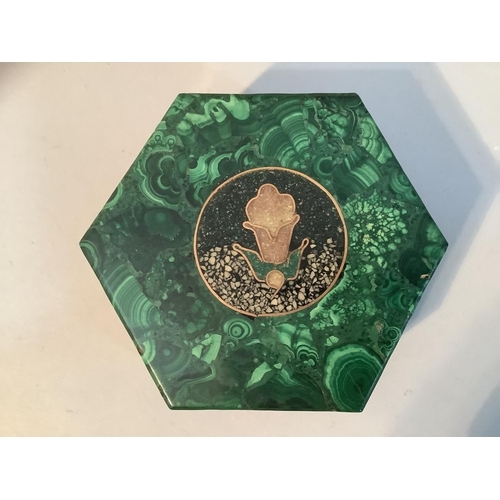 40 - A malachite composition box and cover of hexagonal outline, the cover inlaid in terrazzo and gilt me... 