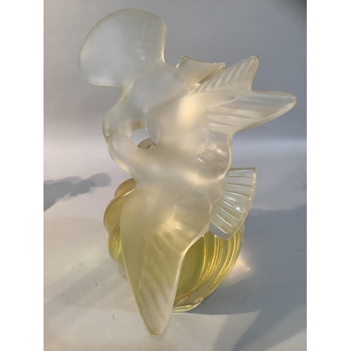 1 - A set of five Lalique factice perfume bottles for Nina Ricci L'Air du Temps of graduated size, the w... 