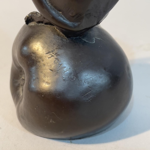 53 - A Heredites series bronze effect resin figure of a field mouse on an apple with it's tail tucked up,... 