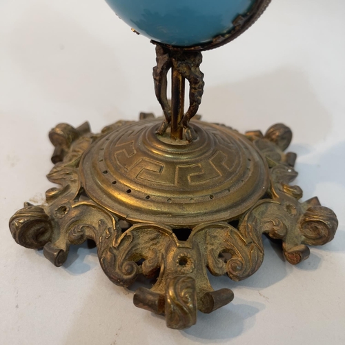 55 - A Victorian gilt metal mounted turquoise glass pedestal casket of quatrefoil outline, flower finial,... 