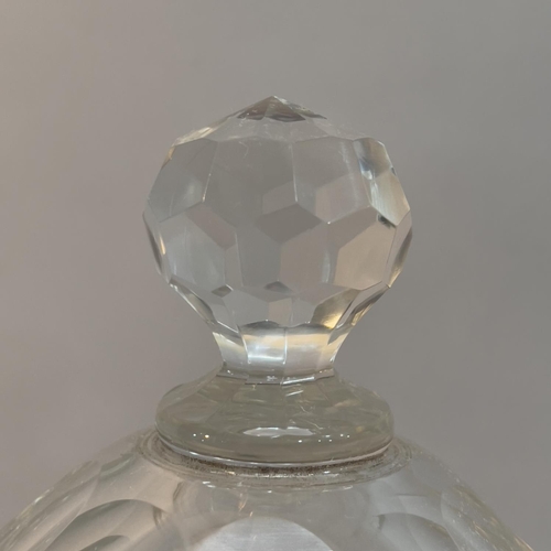 67 - A late 19th/early 20th century cut glass pedestal vase and cover with faceted knop finial and on ste... 