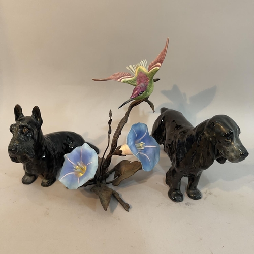 205 - A Boehm flower and hummingbird figure group with Boehm back stamp, a Royal Doulton Scottie dog HN101... 