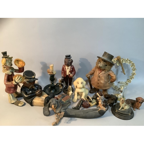 261 - A resin figure of a hedghog in suit with hat, a ceramic model of a conductor asleep with pipe, a can... 