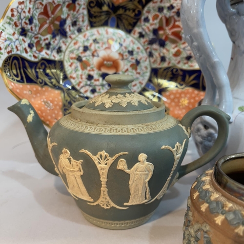 196 - A 19th century Ridgeway & Co blue pottery jug, pewter lidded, and enamelled with trailing flowers in... 