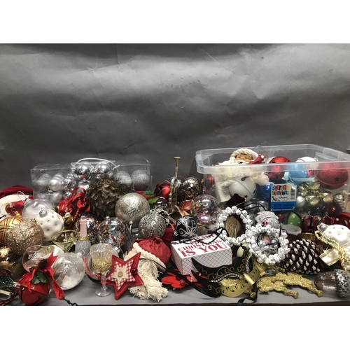 123 - A quantity of gold, silver and red baubles, decorations and bells in three boxes