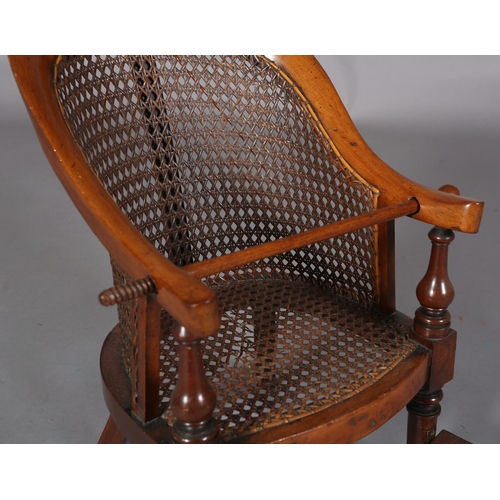 150 - A VICTORIAN CHILD'S MAHOGANY AND BERGERE CANED TUB BACK CHAIR, on turned legs with foot rest and res... 