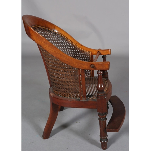 150 - A VICTORIAN CHILD'S MAHOGANY AND BERGERE CANED TUB BACK CHAIR, on turned legs with foot rest and res... 