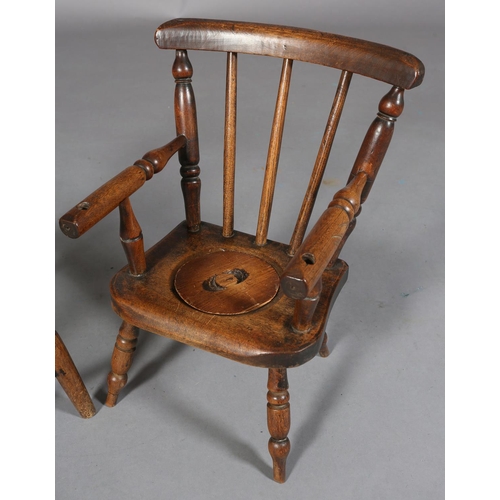 151 - A VICTORIAN CHILD'S ELM AND BEECH POTTY CHAIR, lid to seat, on turned legs, 49cm high, together with... 