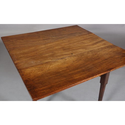 184 - A MID 18TH CENTURY FIGURED MAHOGANY PEMBROKE TABLE, having twin rectangular leaves, on rounded legs ... 