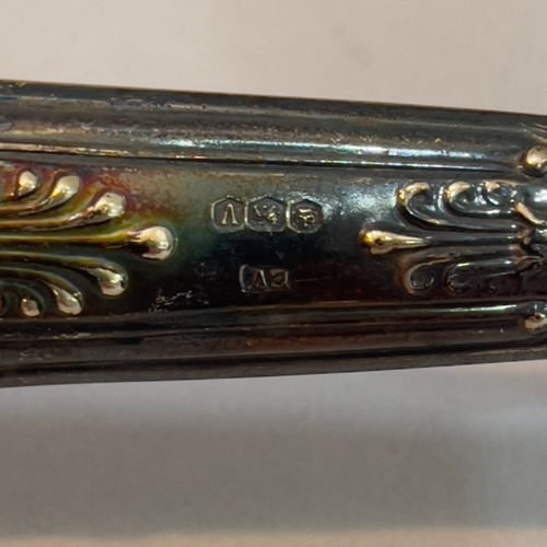 341 - A silver napkin ring of engine turned decoration and engraved 'Mary', Birmingham 1926 together with ... 