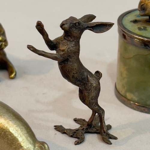 352 - A white metal and Connemara drum trinket box, the lid mounted with a rabbit finial, together with a ... 