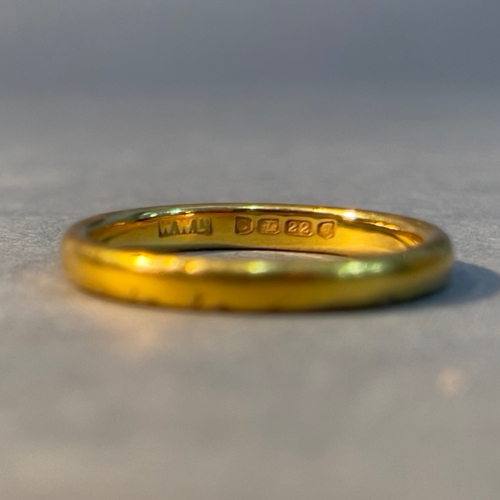 396 - A wedding ring in 22ct gold by W.Wilkinson Ltd, the court shaped design approximately 2.6mm wide
App... 